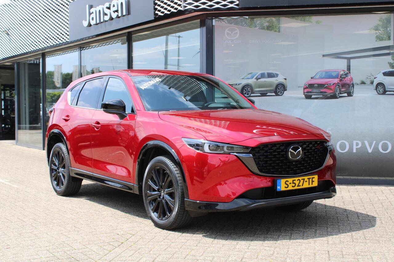 Mazda CX-5 2.0 SkyActiv-G 165 Homura , Automaat, Half Leder, 360 Camera, Adap. Cruise, Navi, LKA, Elektrische klep, Apple Carplay, HUD, Stoelverwarming, Stuurverwarming, Clima, LMV 19 Inch