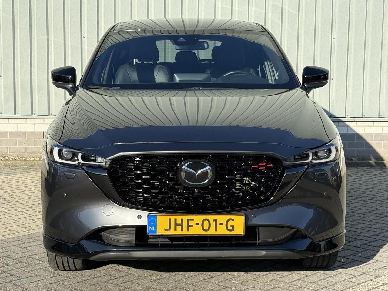 Mazda CX-5 2.0 e-SkyActiv-G M Hybrid 165 Homura / Fabrieksgarantie t/m 04-2027 / Comfort Pack / 19" LMV / 2.000 kg Trekgewicht / Lederen bekleding / Stoelventilatie voor / Verwarmde stoelen voor en achter / Adaptive Cruise / Rondomzicht Camera / Bose Audio /