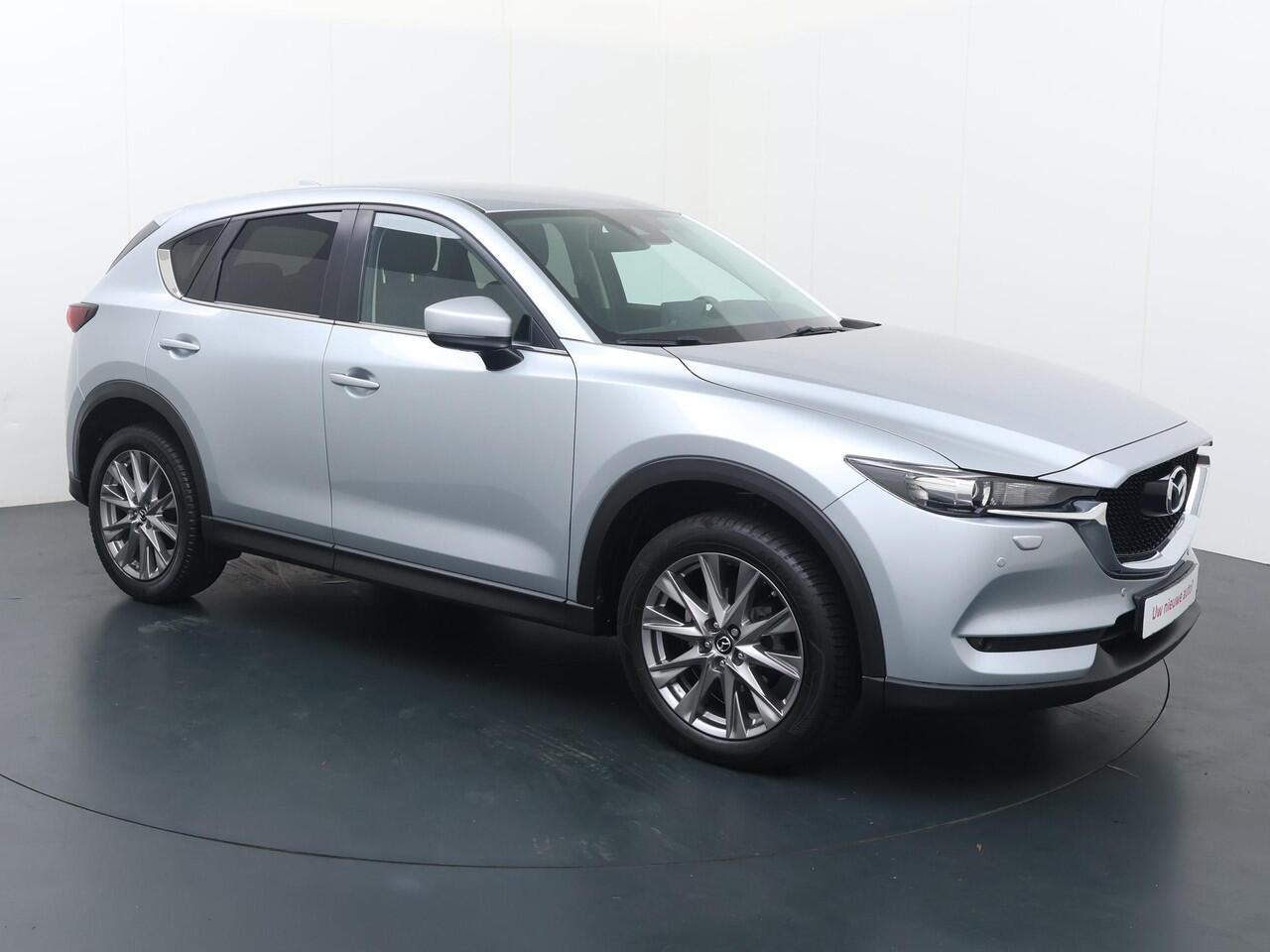 Mazda CX-5 2.0 SkyActiv-G 165 Comfort | 165 PK | Automaat | Multifunctioneel stuurwiel | Spraakbediening | Cruise control | Automatische verlichting | Dab+ | Bluetooth | Navigatie | PDC Voor + Achter | Stuurverwarming | Stoelverwarming | Climate | Autohold |