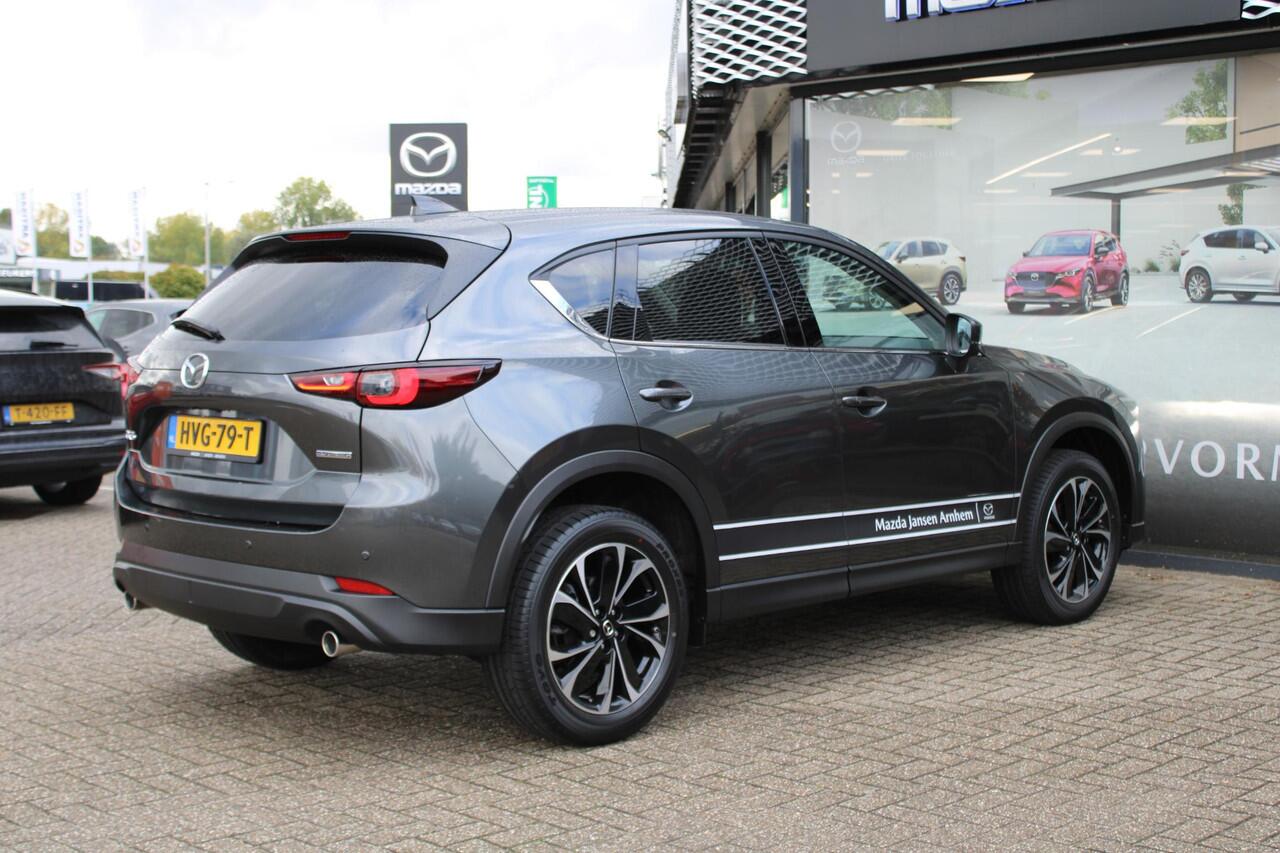 Mazda CX-5 2.0 e-SkyActiv-G M Hybrid 165 Exclusive-Line , Demovoordeel ¤ 5.000,-, Black Comfort Pack, Navi, Adap.Cruise, Clima, Leder, Apple Carplay, 360 Camera, PDC, HUD, Stoelverwarming/ventilatie, 19" LMV