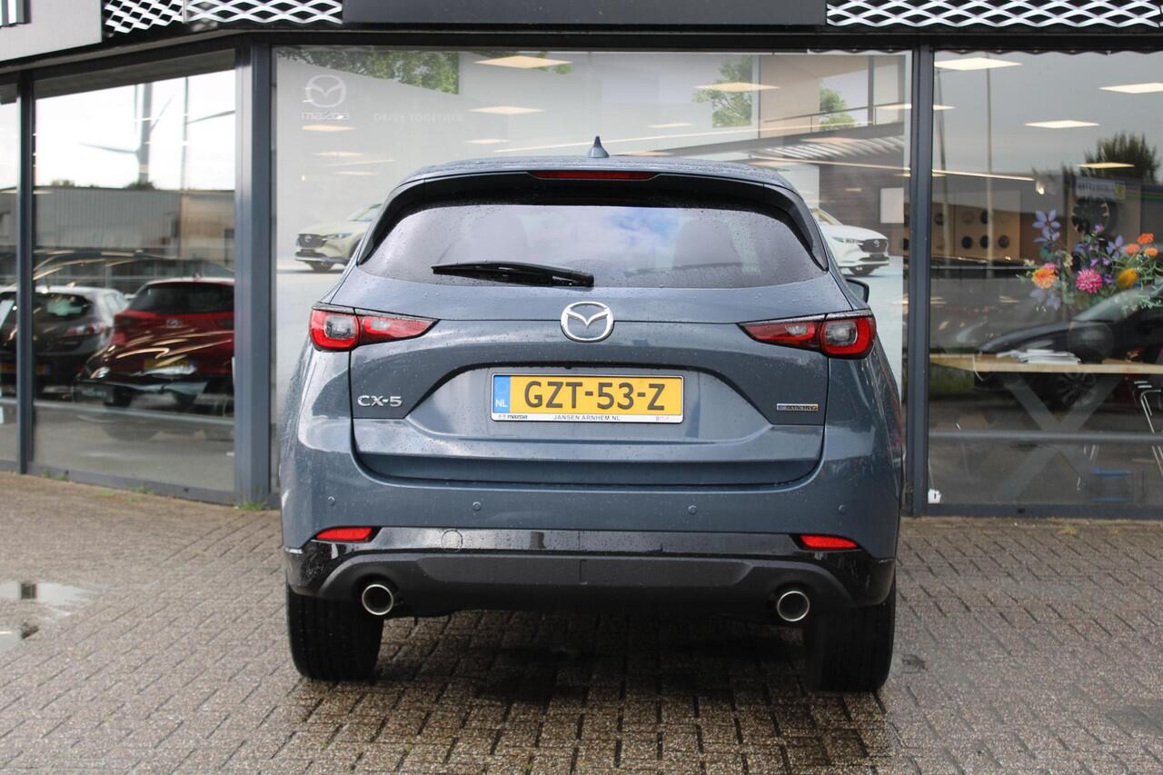 Mazda CX-5 2.0 e-SkyActiv-G M Hybrid 165 Homura & Comfort Pack, Demovoordeel ¤ 7.390-, Navi, Adap.Cruise, Clima, Leder, Apple Carplay, 360 Camera, PDC, HUD, Stoelverwarming/ventilatie, 19" LMV, Elek.Achterklep