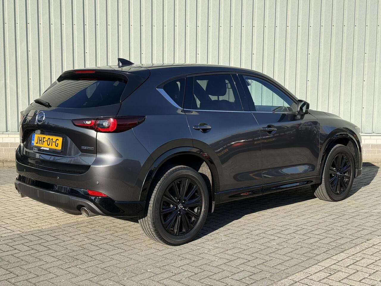 Mazda CX-5 2.0 e-SkyActiv-G M Hybrid 165 Homura / Fabrieksgarantie t/m 04-2027 / Comfort Pack / 19" LMV / 2.000 kg Trekgewicht / Lederen bekleding / Stoelventilatie voor / Verwarmde stoelen voor en achter / Adaptive Cruise / Rondomzicht Camera / Bose Audio /