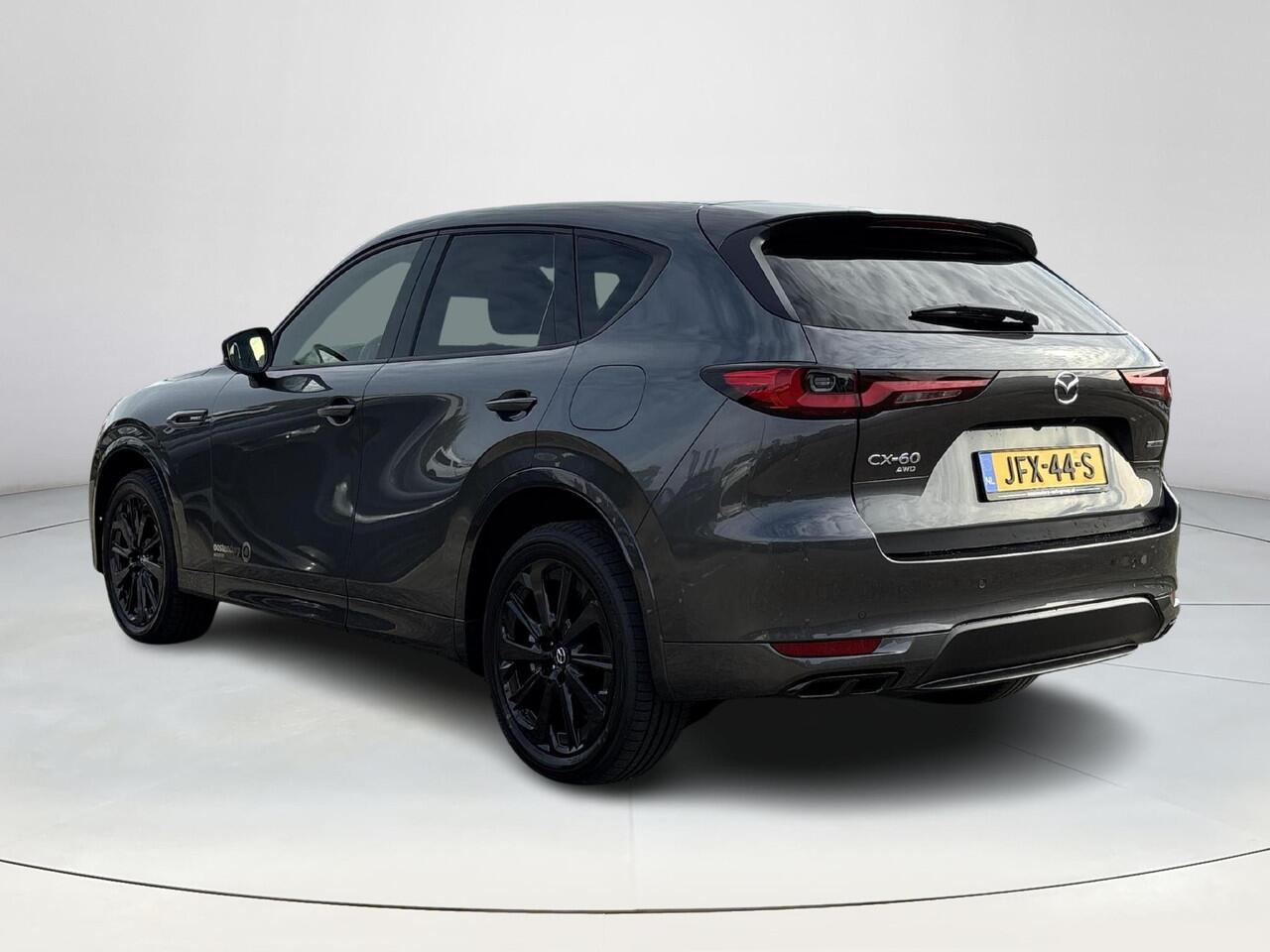 Mazda CX-60 2.5 e-SkyActiv PHEV Homura Business Edition | Stoelverwarming/verkoeling | Adaptive cruisecontrol | Lederen bekleding | Elektrische stoelen met geheugenfunctie | Stuurwiel elektrisch verstelbaar |360* camera | Elektronische achterklep |