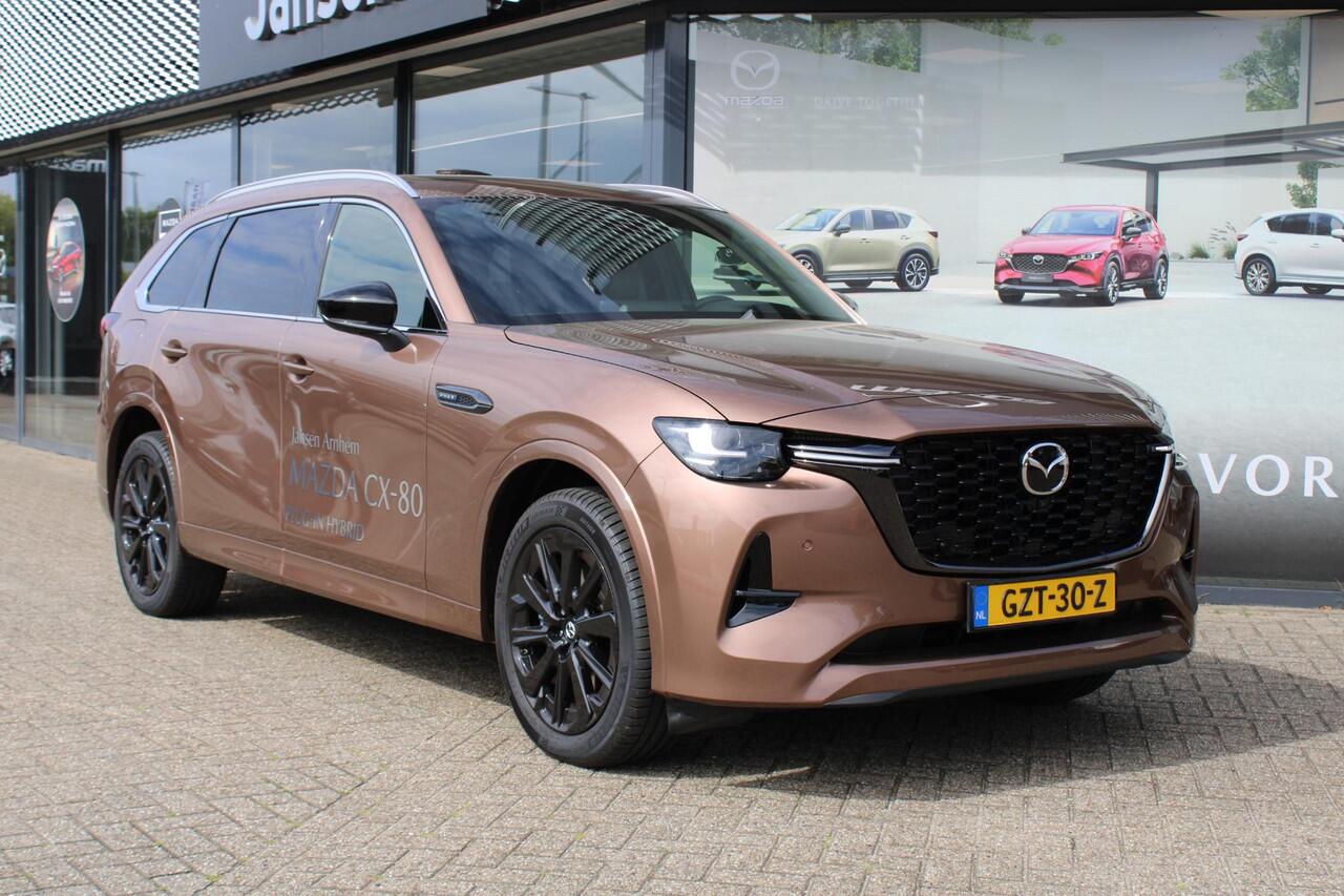 Mazda CX-80 2.5 e-SkyActiv PHEV Homura Plus , Demovoordeel ¤ 13.740,-, Automaat, Pano/Schuifdak, Klasse 3 Alarm, 7-Zits, Leder, 360 Camera, Bose, Adap Cruise, LMV 20 Inch