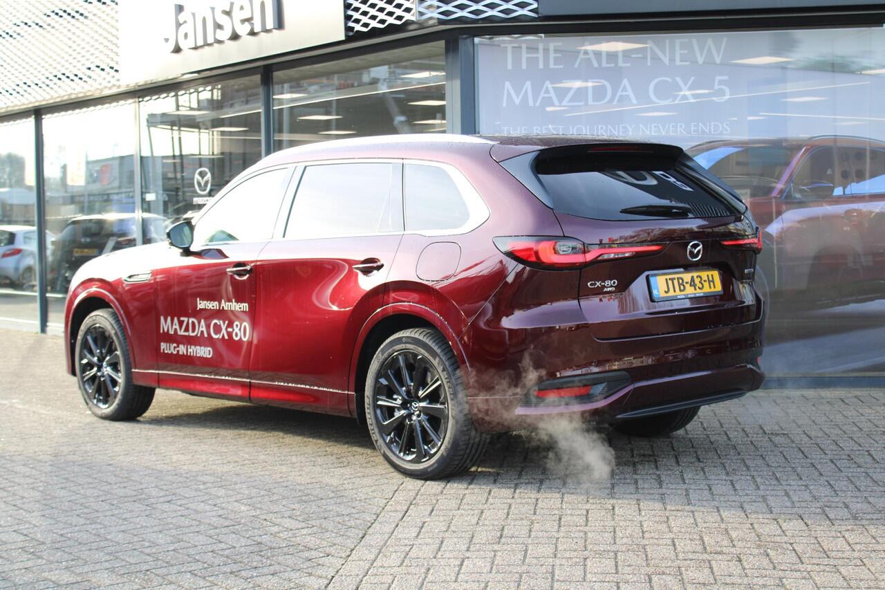 Mazda CX-80 2.5 e-SkyActiv PHEV 327 Homura Plus 6p. , Demovoordeel ¤ 8.840,-, Automaat, Pano/Schuifdak, Klasse 3 Alarm, 6-Zits, Leder, 360 Camera, Bose, Adap Cruise, LMV 20 Inch