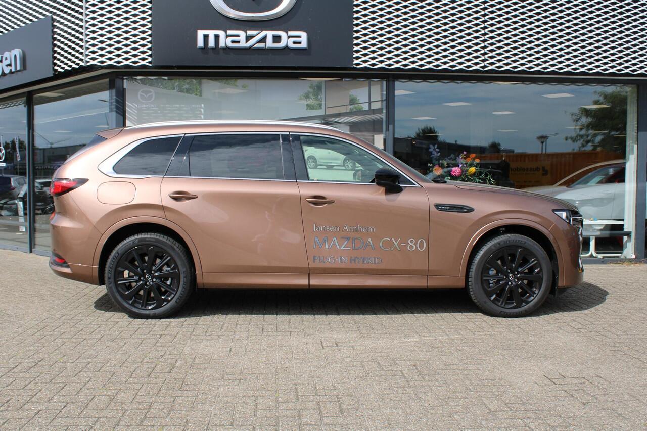 Mazda CX-80 2.5 e-SkyActiv PHEV Homura Plus , Demovoordeel ¤ 13.740,-, Automaat, Pano/Schuifdak, Klasse 3 Alarm, 7-Zits, Leder, 360 Camera, Bose, Adap Cruise, LMV 20 Inch