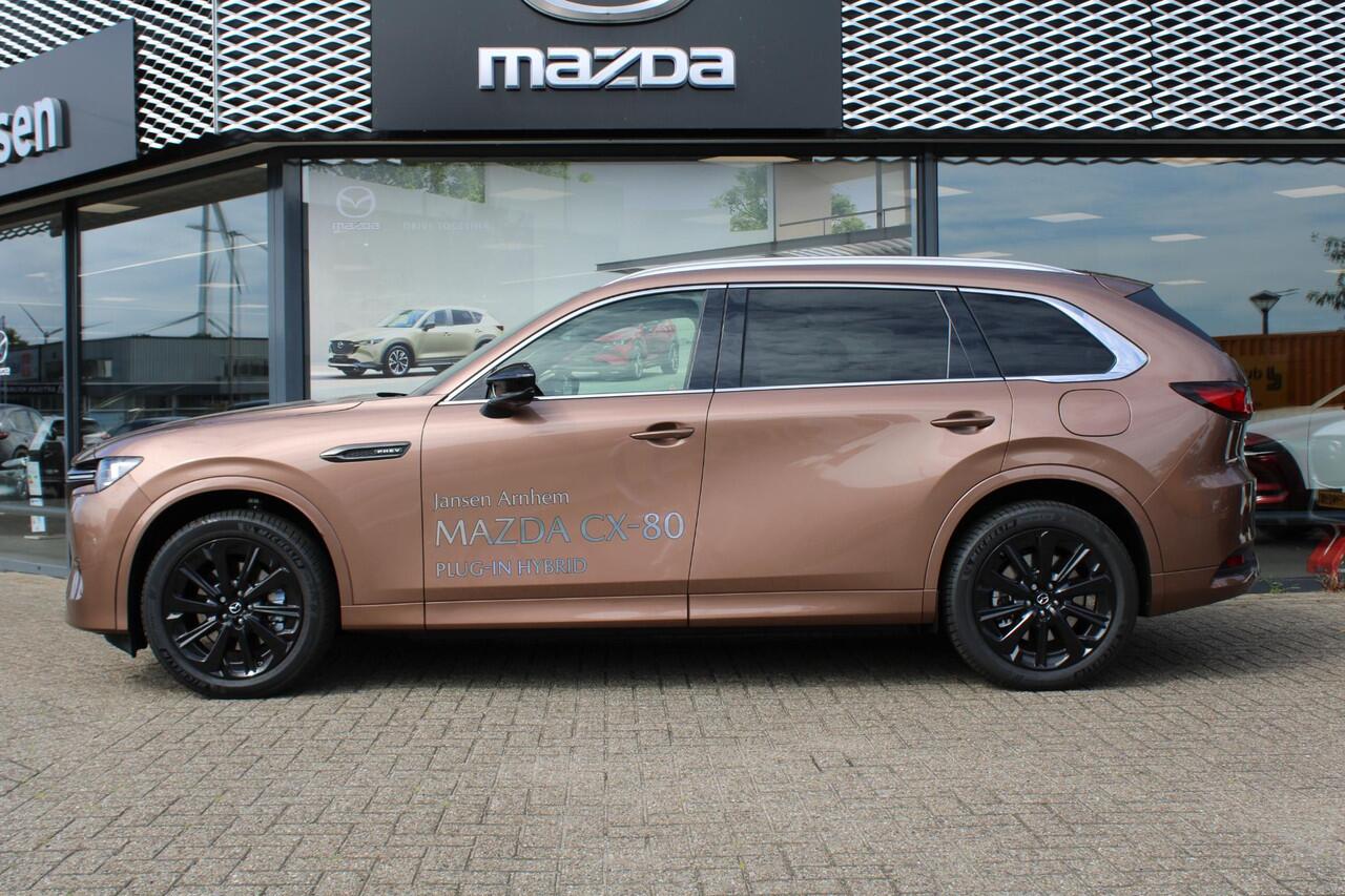 Mazda CX-80 2.5 e-SkyActiv PHEV Homura Plus , Demovoordeel ¤ 13.740,-, Automaat, Pano/Schuifdak, Klasse 3 Alarm, 7-Zits, Leder, 360 Camera, Bose, Adap Cruise, LMV 20 Inch