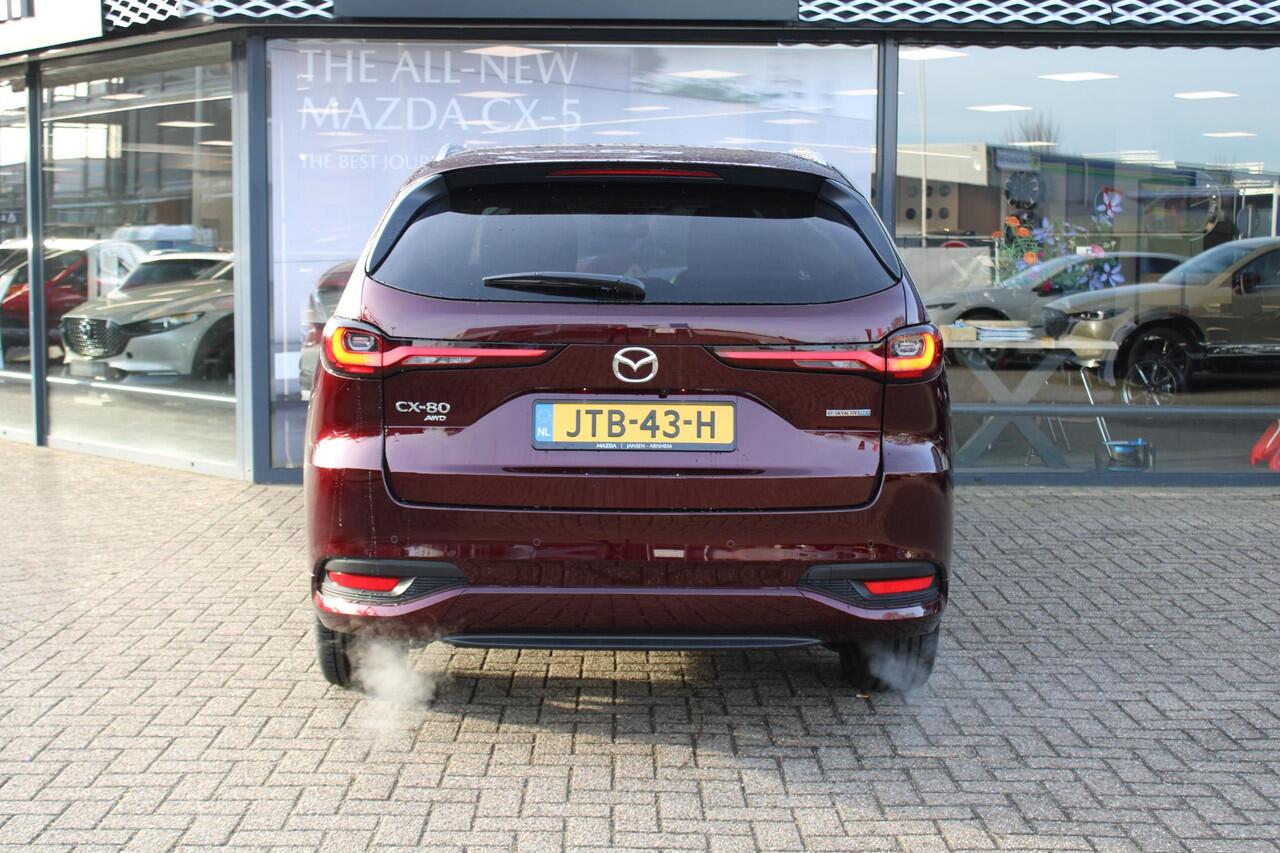 Mazda CX-80 2.5 e-SkyActiv PHEV 327 Homura Plus 6p. , Demovoordeel ¤ 8.840,-, Automaat, Pano/Schuifdak, Klasse 3 Alarm, 6-Zits, Leder, 360 Camera, Bose, Adap Cruise, LMV 20 Inch