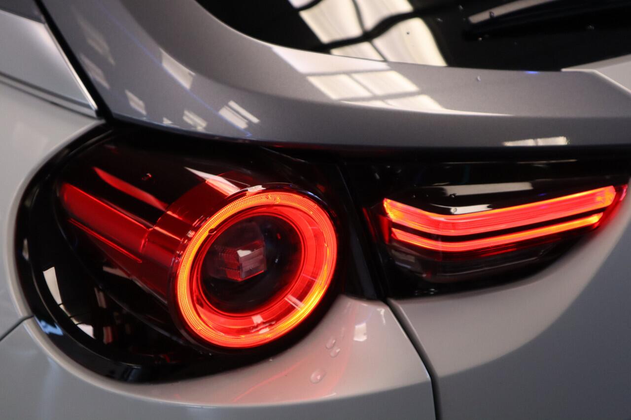 Mazda MX-30 e-SkyActiv 145 First Edition 36 kWh Navigatie Halfleder interieur 18 lmv lane ass. 24 maanden garantie mogelijk (*vraag naar de voorwaarden)