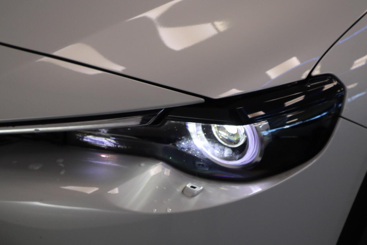 Mazda MX-30 e-SkyActiv 145 First Edition 36 kWh Navigatie Halfleder interieur 18 lmv lane ass. 24 maanden garantie mogelijk (*vraag naar de voorwaarden)