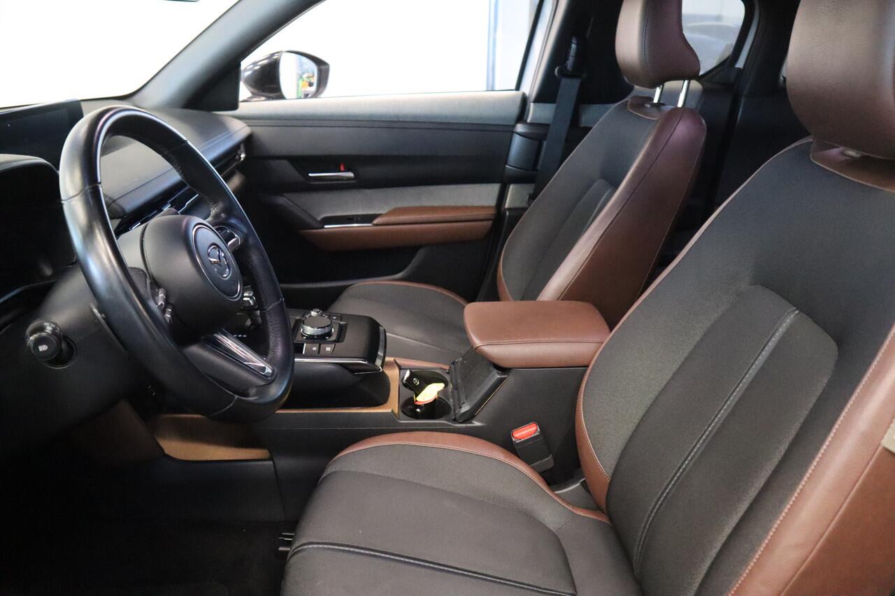 Mazda MX-30 e-SkyActiv 145 First Edition 36 kWh Navigatie Halfleder interieur 18 lmv lane ass. 24 maanden garantie mogelijk (*vraag naar de voorwaarden)