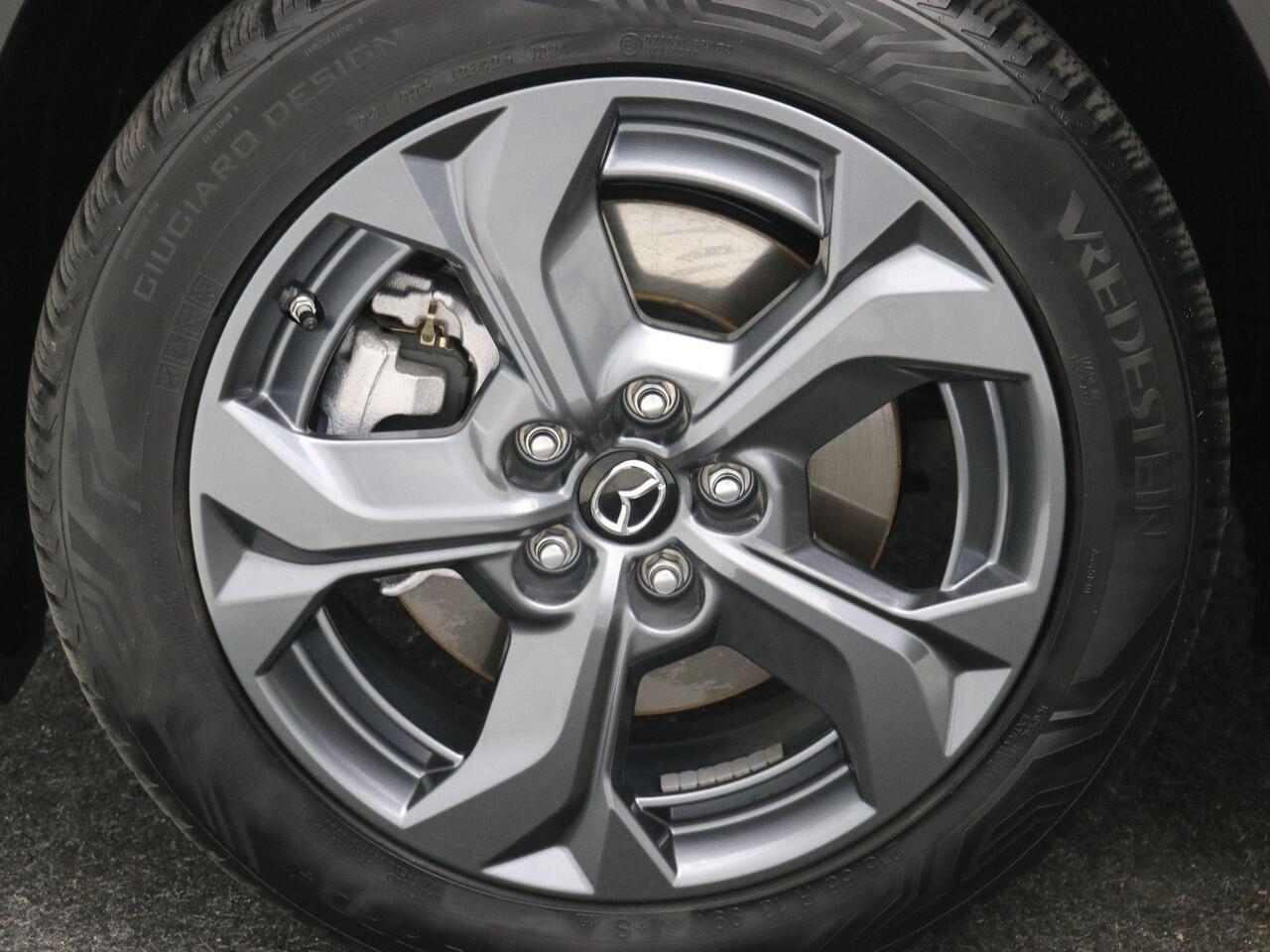 Mazda MX-30 e-SkyActiv R-EV 170 Exclusive-line AUTOMAAT / Plug-in-Hybride / 1ste Eigenaar / Historie aanwezig / HUD Display / Adaptieve Cruise Control / All seasonbanden / Navigatie / Stoel & Stuurwiel verwarming / Full Option /