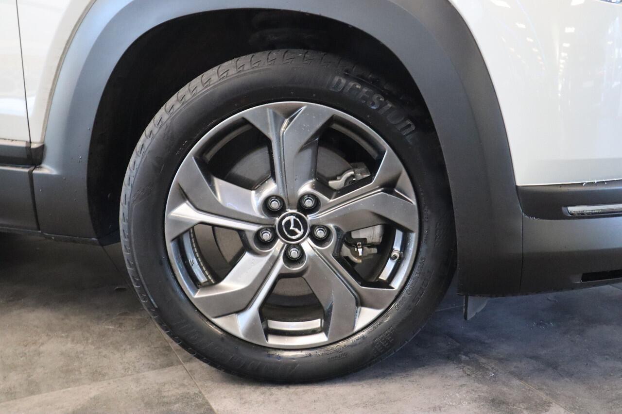 Mazda MX-30 e-SkyActiv 145 First Edition 36 kWh Navigatie Halfleder interieur 18 lmv lane ass. 24 maanden garantie mogelijk (*vraag naar de voorwaarden)