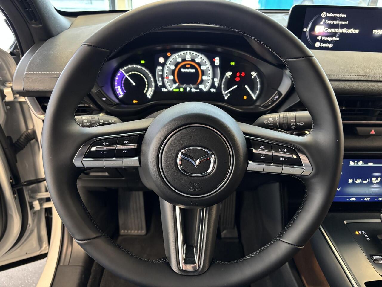 Mazda MX-30 e-SkyActiv R-EV 170 Nagisa , Demovoordeel ¤ 9.250-, Half Leder, Bose, Adap.Cruise, Navi, Apple Carplay, Clima, Camera, PDC, HUD, Stuur/Stoelverwarming, 18" LMV