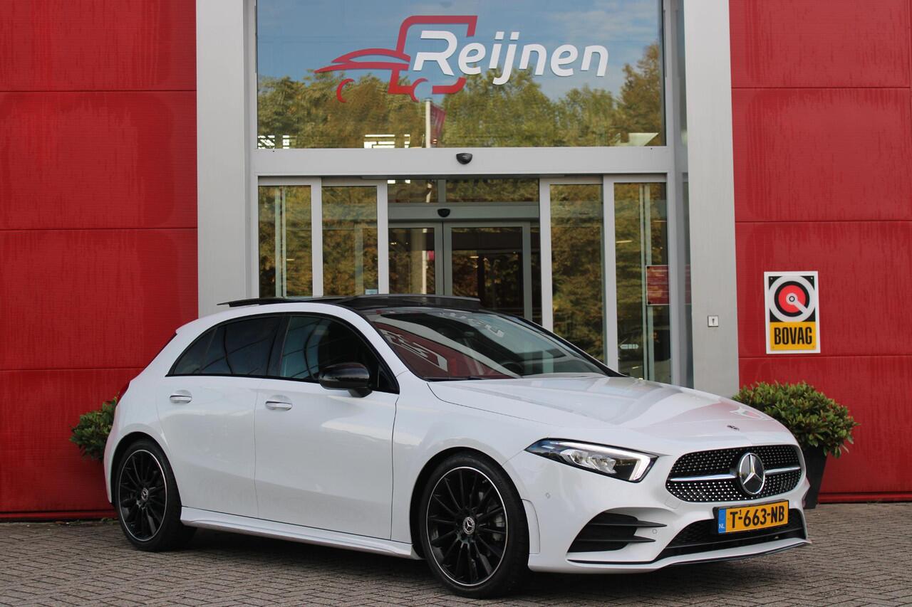 Mercedes-Benz A-KLASSE 180 136PK AMG LINE AUTOMAAT | PANORAMISCH SCHUIF/KANTEL DAK | KEYLESS ENTRY / GO | NAVIGATIE | ACHTERUITRIJ CAMERA | PARKEERSENSOREN VOOR EN ACHTER | HIGH PERFORMANCE LED KOPLAMPEN | STOEL VERWARMING | SPIEGEL PAKKET | NIGHT PAKKET | LICHTMETALEN VELGEN 1