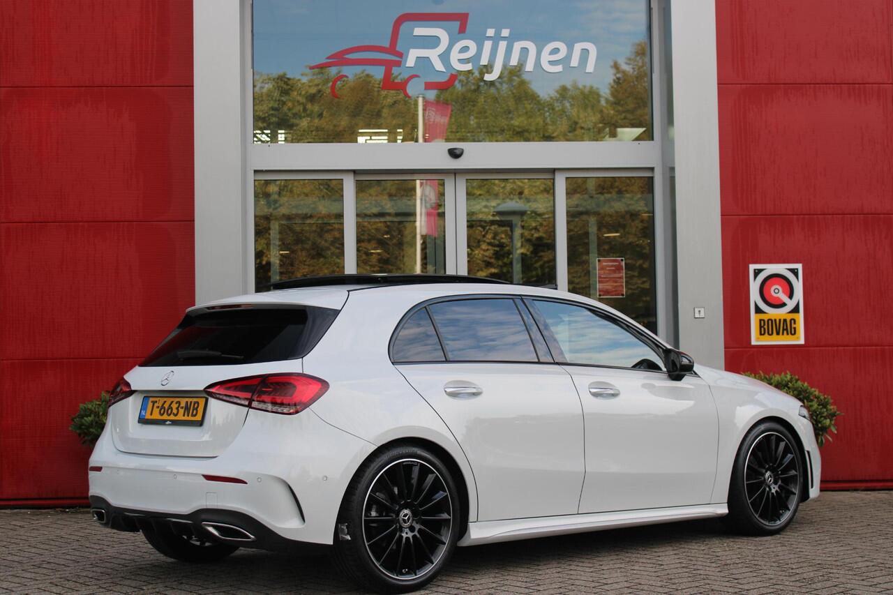 Mercedes-Benz A-KLASSE 180 136PK AMG LINE AUTOMAAT | PANORAMISCH SCHUIF/KANTEL DAK | KEYLESS ENTRY / GO | NAVIGATIE | ACHTERUITRIJ CAMERA | PARKEERSENSOREN VOOR EN ACHTER | HIGH PERFORMANCE LED KOPLAMPEN | STOEL VERWARMING | SPIEGEL PAKKET | NIGHT PAKKET | LICHTMETALEN VELGEN 1