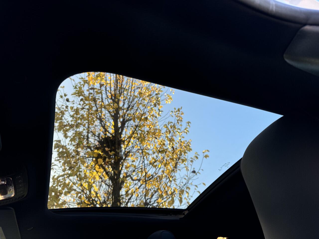 Mercedes-Benz A-KLASSE 180 AMG Aut Panoramadak Nightpakket Widescreen SfeerVerlichting Keyless SportLeder Led Camera Pdc