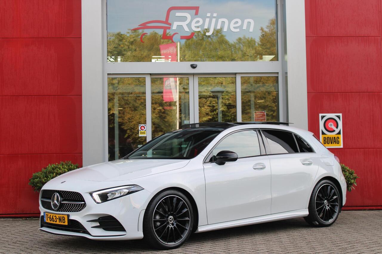 Mercedes-Benz A-KLASSE 180 136PK AMG LINE AUTOMAAT | PANORAMISCH SCHUIF/KANTEL DAK | KEYLESS ENTRY / GO | NAVIGATIE | ACHTERUITRIJ CAMERA | PARKEERSENSOREN VOOR EN ACHTER | HIGH PERFORMANCE LED KOPLAMPEN | STOEL VERWARMING | SPIEGEL PAKKET | NIGHT PAKKET | LICHTMETALEN VELGEN 1