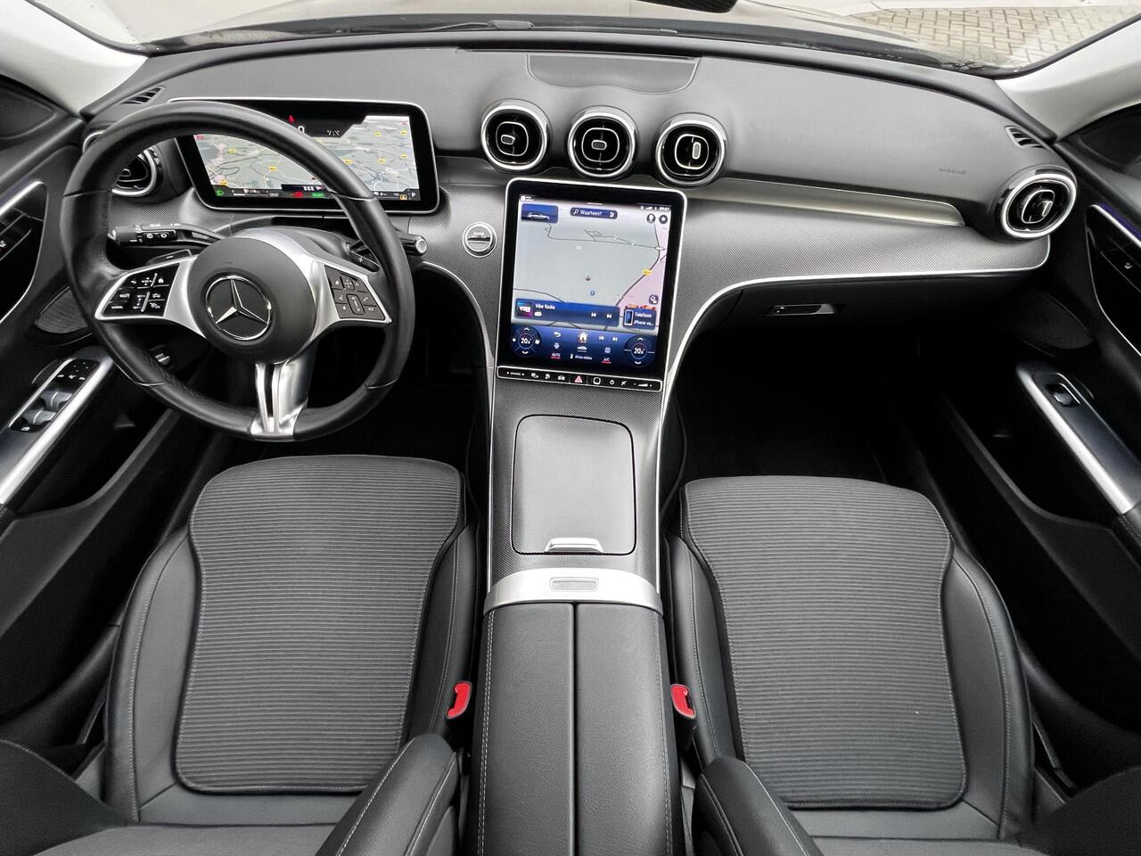 Mercedes-Benz C-KLASSE Estate 300 e Luxury Line Automaat 9 traps / Elektrische trekhaak 1.800 kg / EAER bereik 111 km / Avantgarde Interieur / Elektr. klep / Adapt. CC / Navigatie groot scherm / Winterwielenset /