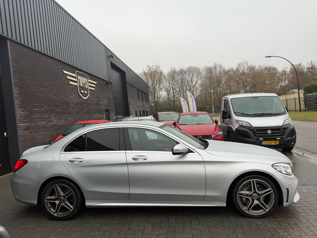 Mercedes-Benz C-KLASSE 180 Business Solution AMG | AUTOMAAT | 12MND GARANTIE | CARPLAY | LMV | PDC | NL AUTO | SFEER VERLICHTING |
