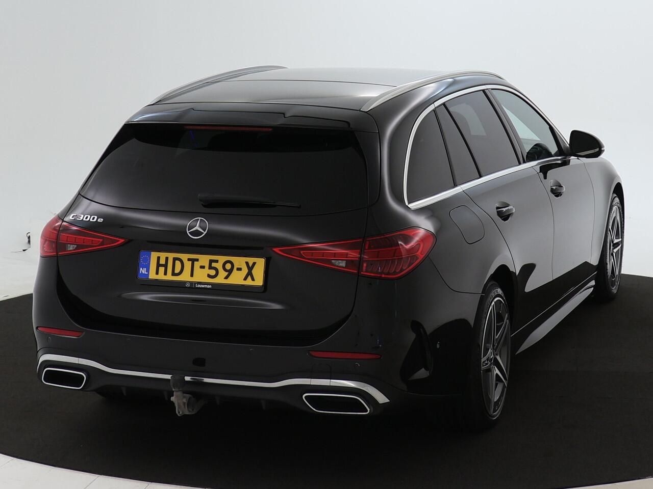 Mercedes-Benz C-KLASSE Estate 300 e AMG Plug-In Hybride | Trekhaak af fabriek | EASY PACK achterklep | Sfeerverlichting | Dodehoek assistent | Keyless Go | Inclusief 24 maanden MB Certified garantie voor Europa.