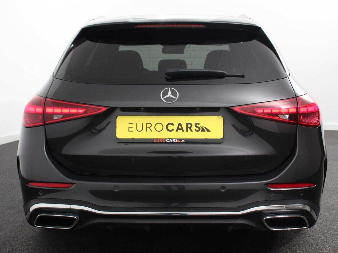 Mercedes-Benz C-KLASSE Estate 200 AMG Line | Climate control | Achteruitrijcamera | Wegklapbare trekhaak | Navigatie | Dodehoek assistent | LED | Sfeerverlichting | Adaptieve cruise control | Verwarmde voorstoelen | Elektrische kofferbak