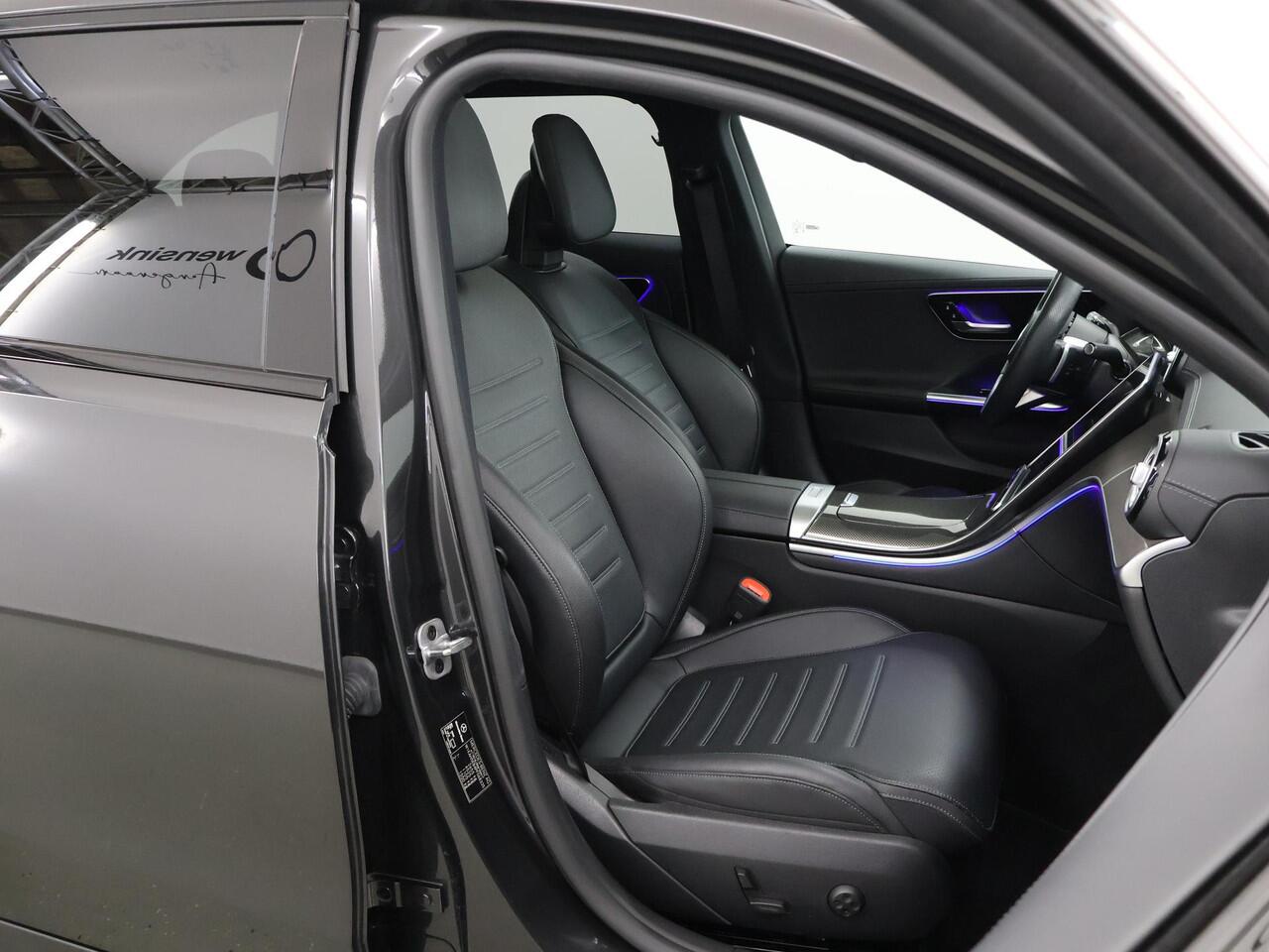 Mercedes-Benz C-KLASSE Estate 300 e AMG Night | Panoramadak | Trekhaak | Sfeerverlichting | Stoelverwarming | Alarm |