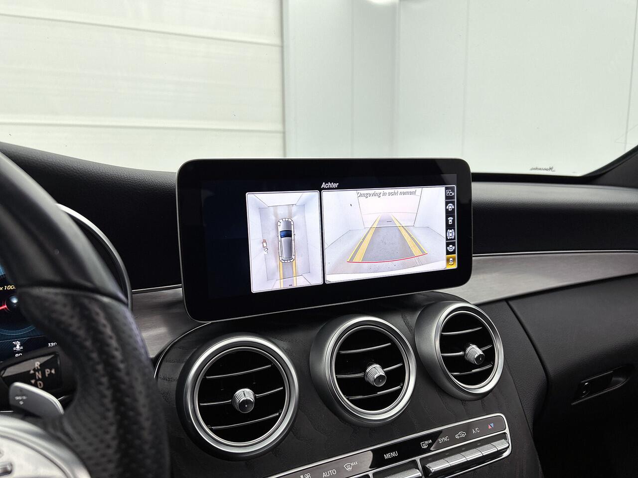 Mercedes-Benz C-KLASSE Estate 180 Business Solution AMG AMG Line | Night Pakket | Panorama Schuif-Kanteldak | Parkeerpakket met 360°-camera | Sfeerverlichting. Inclusief 24 maanden Mercedes-Benz Certified garantie voor Europa.