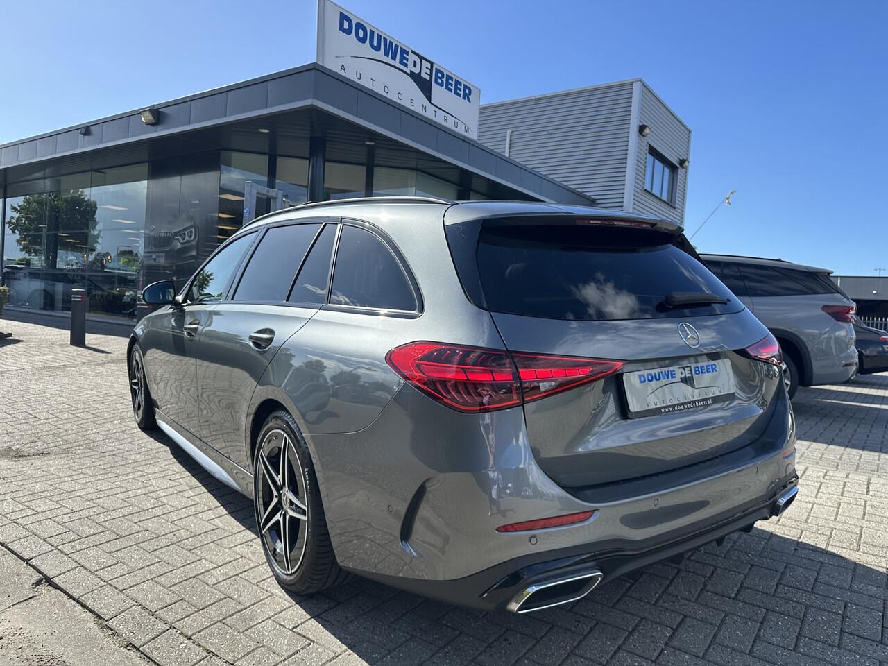 Mercedes-Benz C-KLASSE Estate 180 AMG Line Trekhaak | Pano | Night
