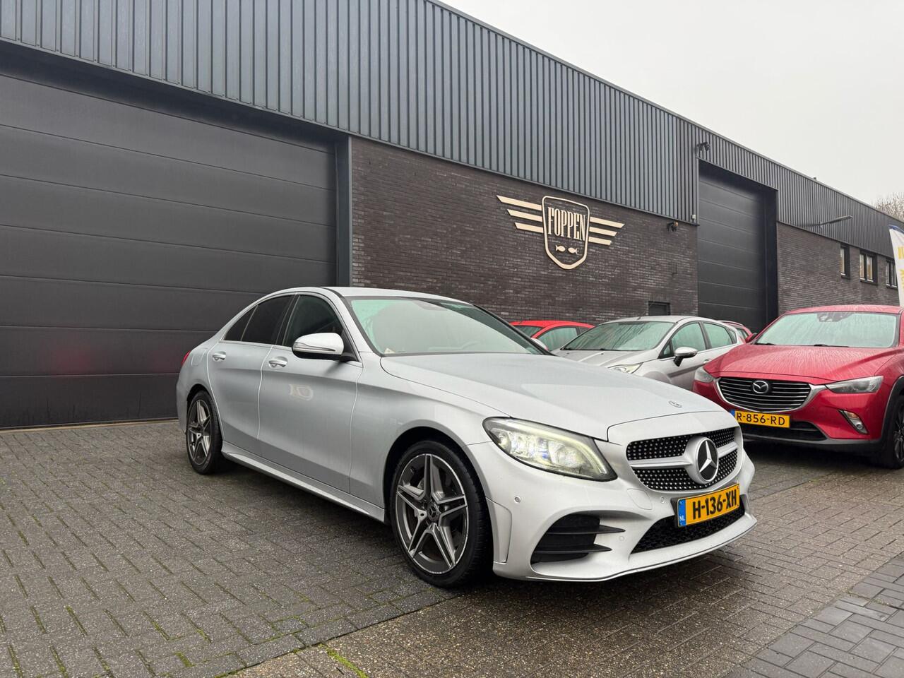 Mercedes-Benz C-KLASSE 180 Business Solution AMG | AUTOMAAT | 12MND GARANTIE | CARPLAY | LMV | PDC | NL AUTO | SFEER VERLICHTING |