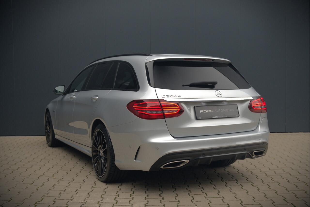 Mercedes-Benz C-KLASSE Estate 300 e Business Solution AMG | Burmester | Carbon | Memory Seats | Keyless | Ambiance Verlichting | 360 Camera | Stoelverwarming | Massage | Adaptive Cruise Control | LED | Head-Up Display | Apple Carplay | Trekhaak | HU