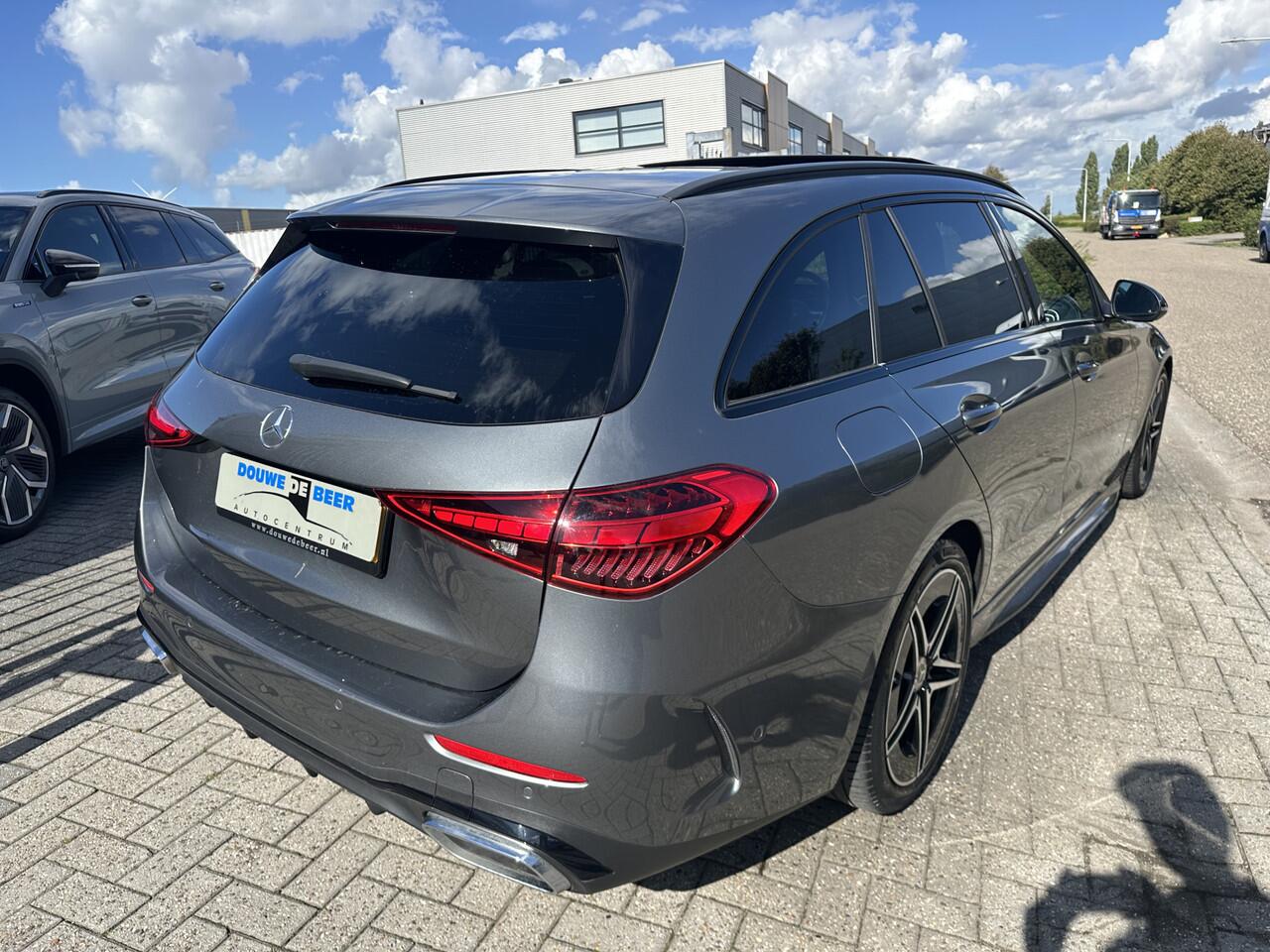 Mercedes-Benz C-KLASSE Estate 180 AMG Line Trekhaak | Pano | Night