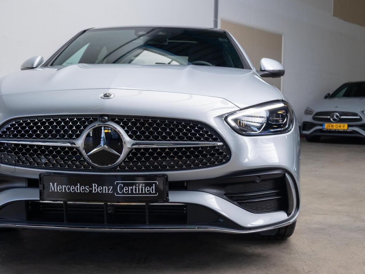 Mercedes-Benz C-KLASSE Limousine 300 e Business Solution AMG Panorama dak