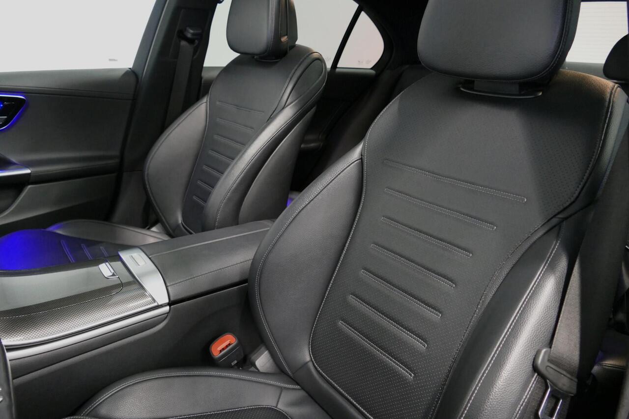 Mercedes-Benz C-KLASSE 200 Launch Edition AMG Line / Orig. Nederlands / C63S AMG Diffuser / Panamericana Grill / Panoramadak / Carbon inleg / Apple Carplay - Android Auto / Ambienteverlichting / Stoelverwarming / 19'' LMV / Cruise Control / Achteruitrijcamera / Widescreen