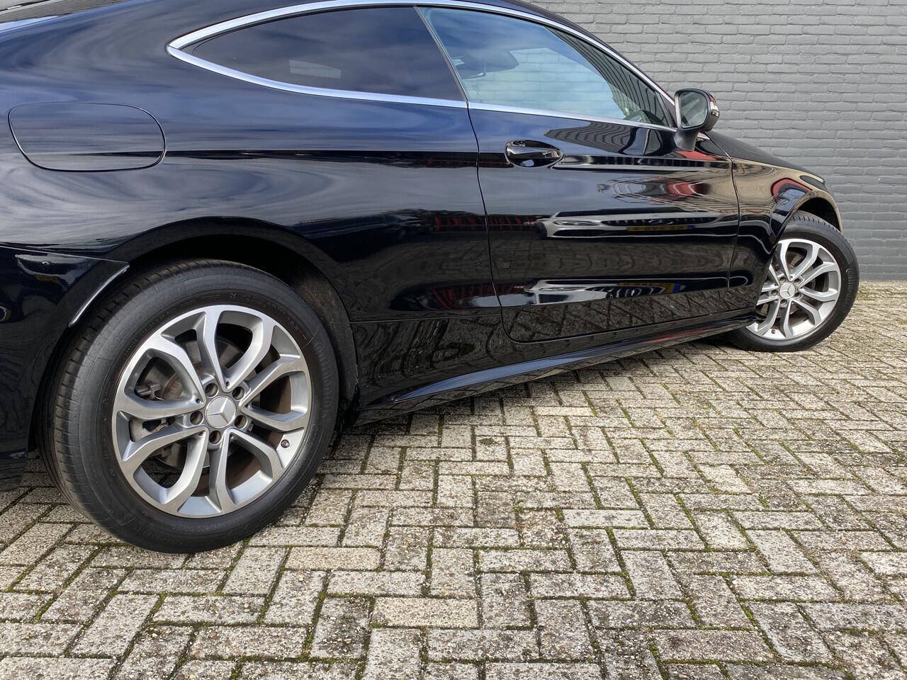 Mercedes-Benz C-KLASSE Coupé 180 AMG Premium Plus Pack AUT. | panoramadak | rood leder | burmester | memory stoelen | 360 camera