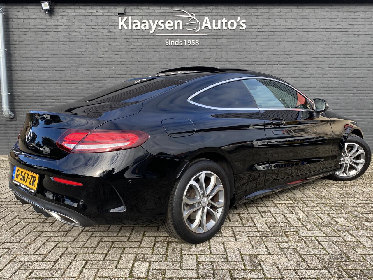 Mercedes-Benz C-KLASSE Coupé 180 AMG Premium Plus Pack AUT. | panoramadak | rood leder | burmester | memory stoelen | 360 camera