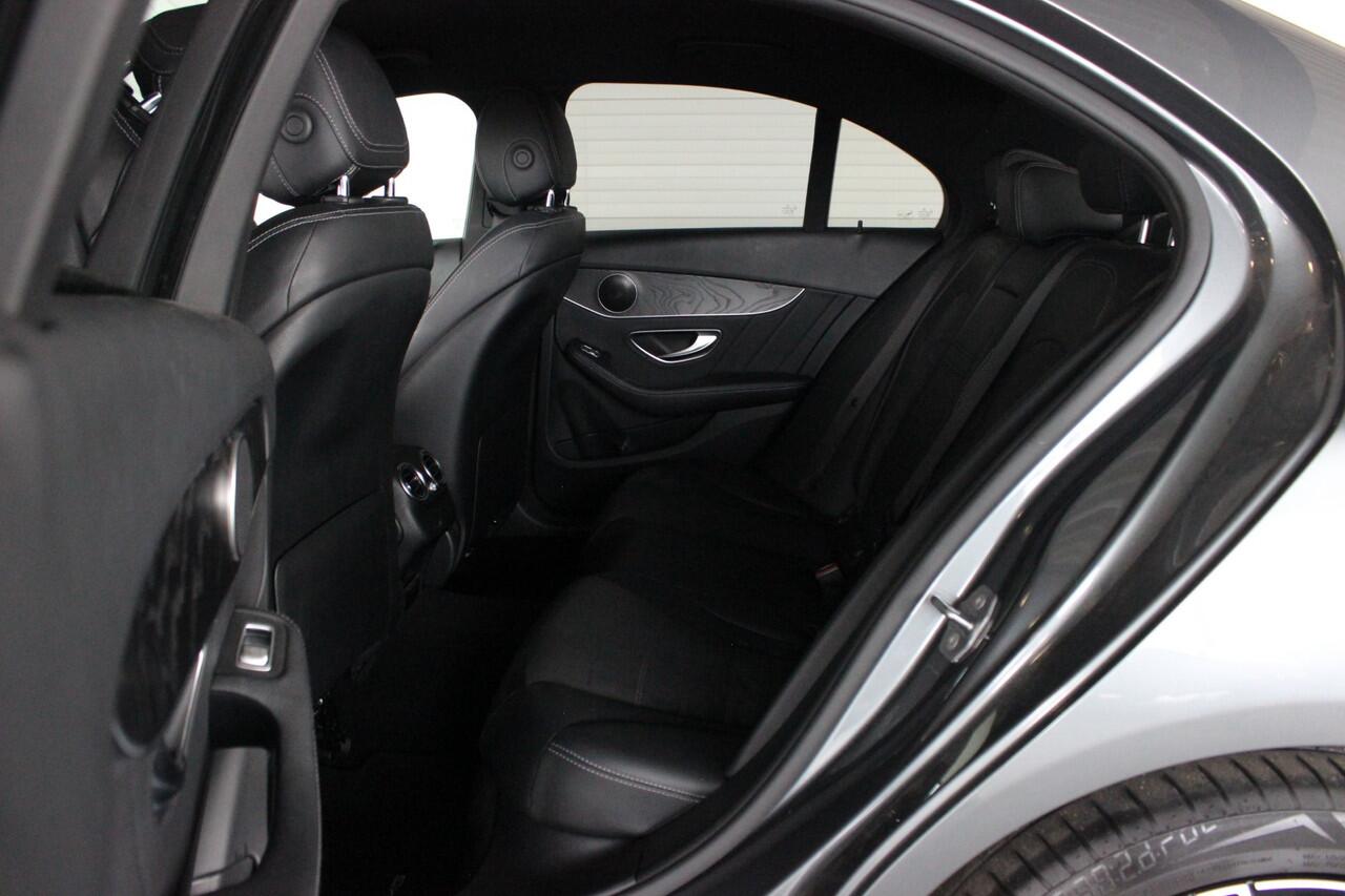 Mercedes-Benz C-KLASSE 180 Business Solution AMG-Line Facelift | Night-pakket | Trekhaak | Carplay | Camera | Virtual Cockpit | Side-Assist | Cruise | 18" LMV | Halfleder | PDC V+A
