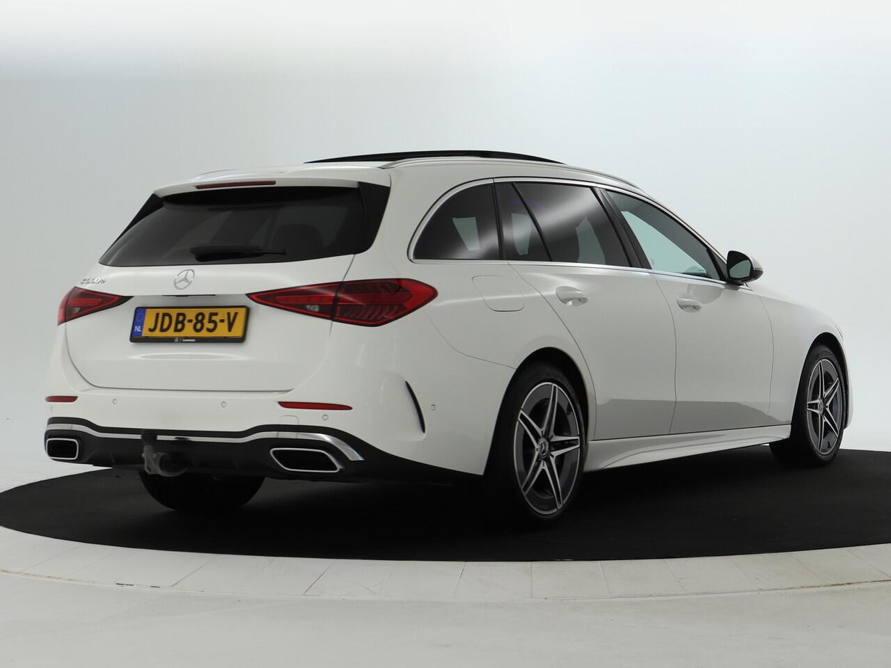 Mercedes-Benz C-KLASSE Estate 300 e AMG Line | AMG Line | Trekhaak | Panoramadak | Distronic | Stuur en Stoelverwarming | Inclusief 48 maanden MB Certified garantie voor Europa.