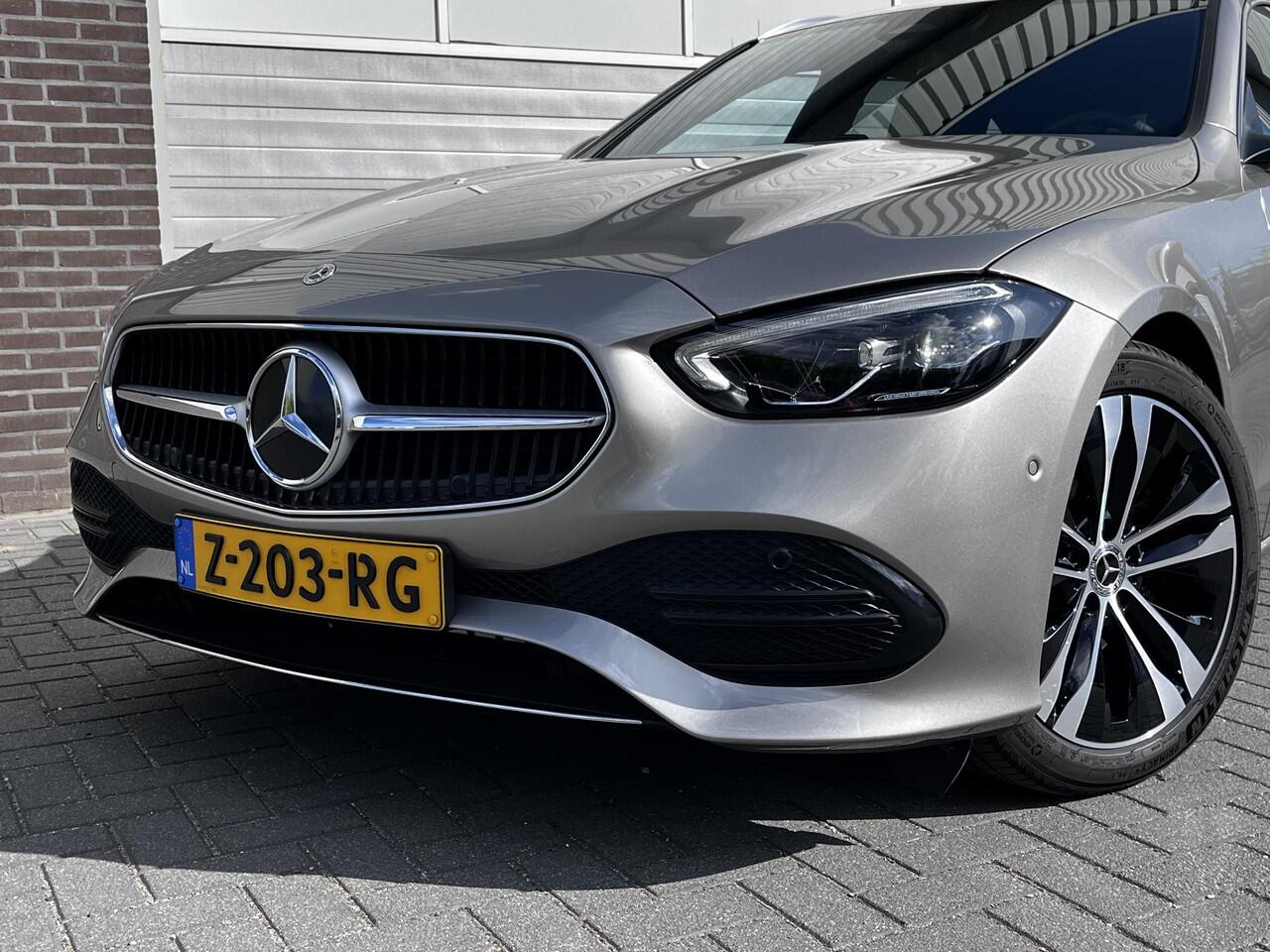 Mercedes-Benz C-KLASSE Estate 180 Luxury Line | Panoramadak | Dodehoekassistent | Privacy Glas Achter | Apple CarPlay | Android Auto | Elektrisch Verstelbare Stoelen + Memory | Sfeerverlichting | Stoelverwarming | Stuurverwarming