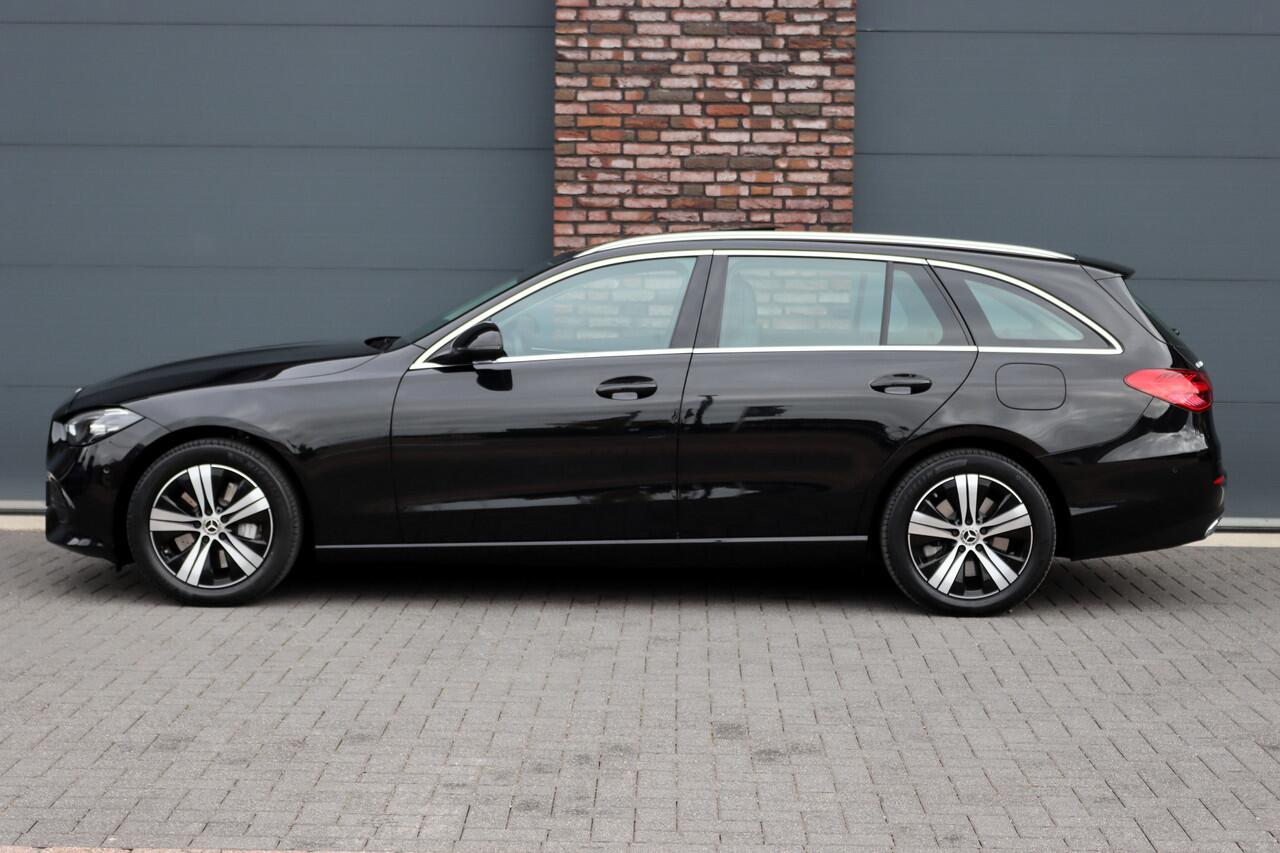 Mercedes-Benz C-KLASSE Estate 300 e Luxury Line | Panoramadak | Camera | Cruise Control | Sfeerverlichting | Dodehoekassistent | High Perf. LED | Apple Carplay/Android Auto | Stoelverwarming |