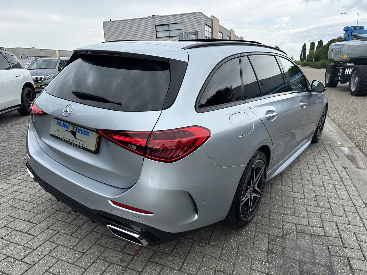 Mercedes-Benz C-KLASSE Estate 180 AMG Line Night Pano-Dak | Camera | Stoelverw. | Spiegel pakket