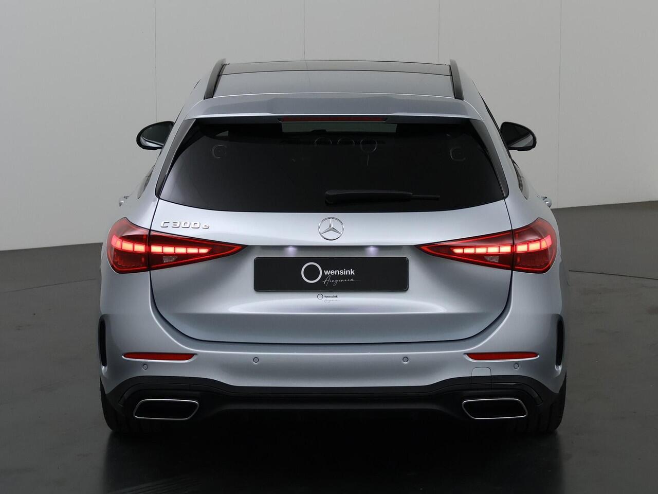 Mercedes-Benz C-KLASSE Estate 300e Business Solution AMG | Panoramadak | Digital Light | Trekhaak | Nightpakket | Memory pakket