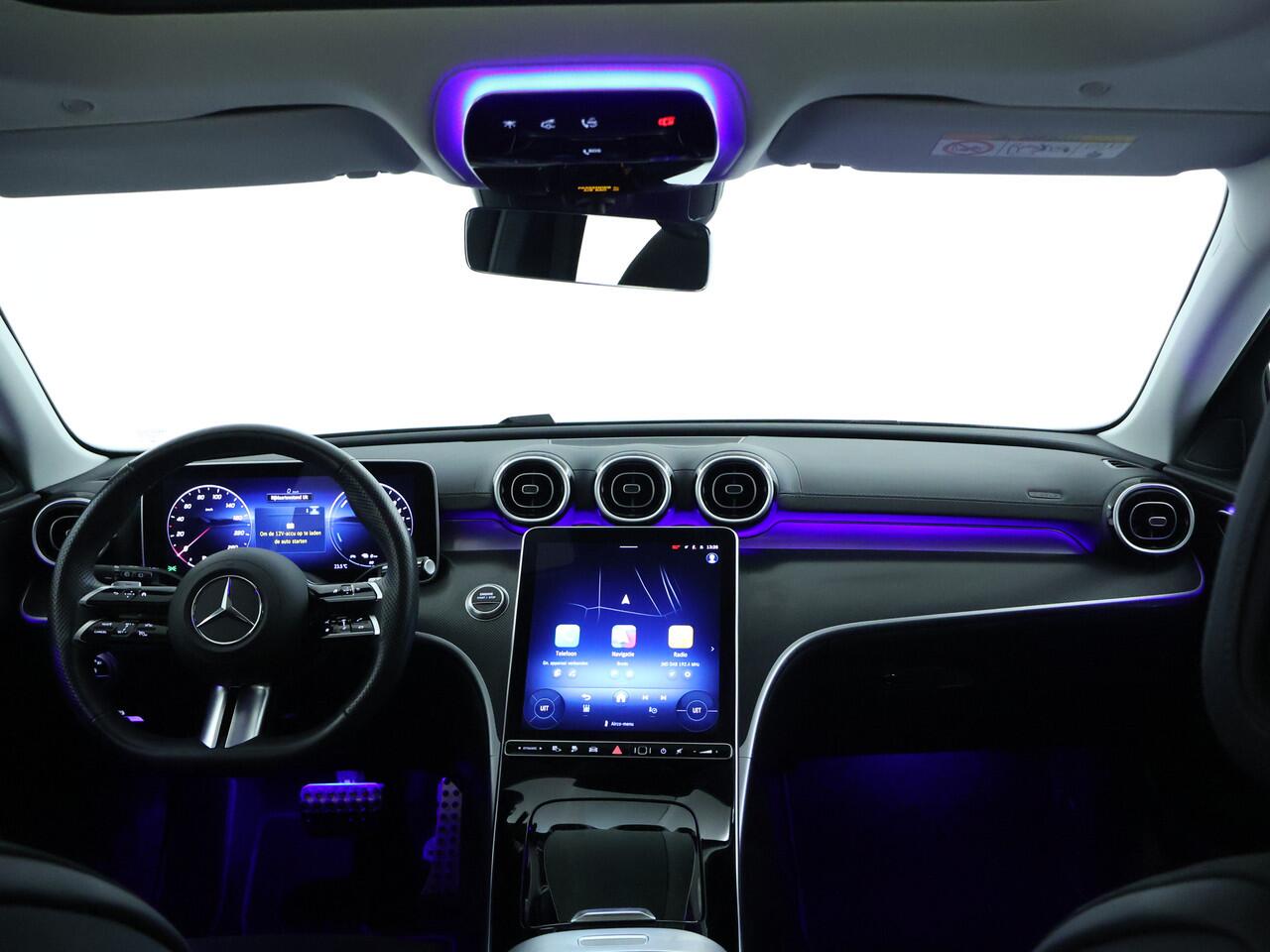 Mercedes-Benz C-KLASSE Estate 300 e AMG Plug-In Hybride | AMG Line | Night Pakket | Trekhaak | Panorama Schuif-Kanteldak | Dodehoek Assist | Stuur en Stoelverwarming | Inclusief 24 maanden MB Certified garantie voor Europa.