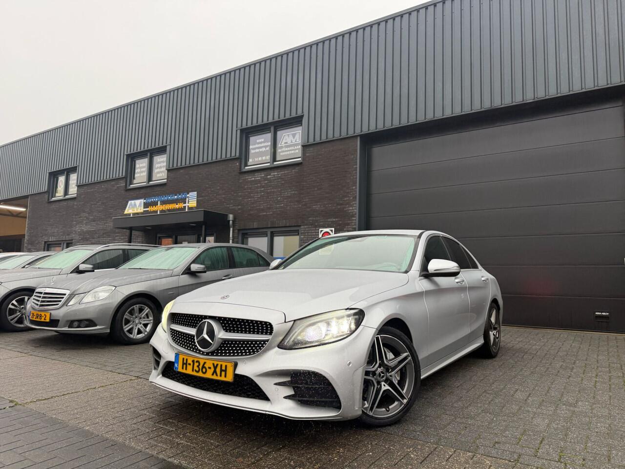 Mercedes-Benz C-KLASSE 180 Business Solution AMG | AUTOMAAT | 12MND GARANTIE | CARPLAY | LMV | PDC | NL AUTO | SFEER VERLICHTING |