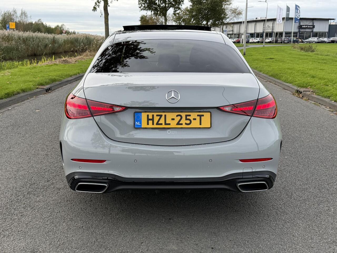 Mercedes-Benz C-KLASSE 180 Business Solution AMG | Panoramadak | Sportstoelen | Digital Light | 360 Camera | DAB | Ele.wegklapbare Trekhaak | Sfeerverlichting | Nightpakket | Spiegelpakket | Apple Carplay/Android Auto |