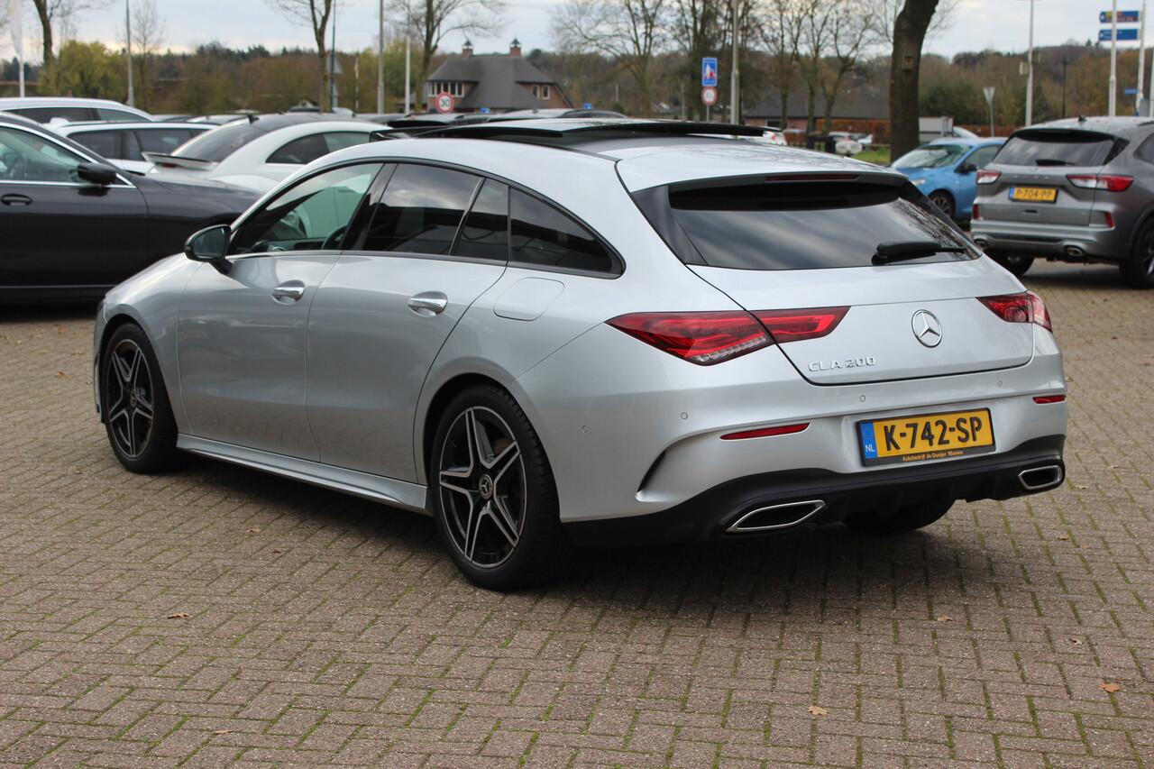 Mercedes-Benz CLA-KLASSE Shooting Brake 200 Business Solution AMG / Trekhaak / Panoramadak / Camera / Memory seats / Keyless / 18'' / Sfeerverlichting / Matrix LED / Navigatie / Stoelverwarming / Cruise Control