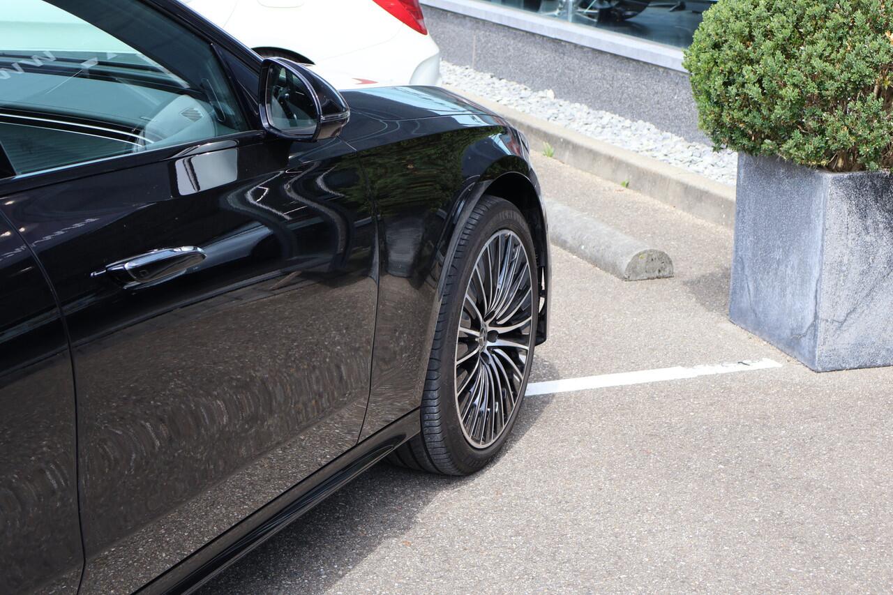 Mercedes-Benz E-KLASSE 300 e AMG Line l Panoramadak l 360 Camera l Head-up l DISTRONIC l Night pakket lBurmester 4 D l Digital Light l Keyless Go l I MBUX l Night pakket I Memory stoelen I Essenhout I Augmented Reality I Stoelverwarming l