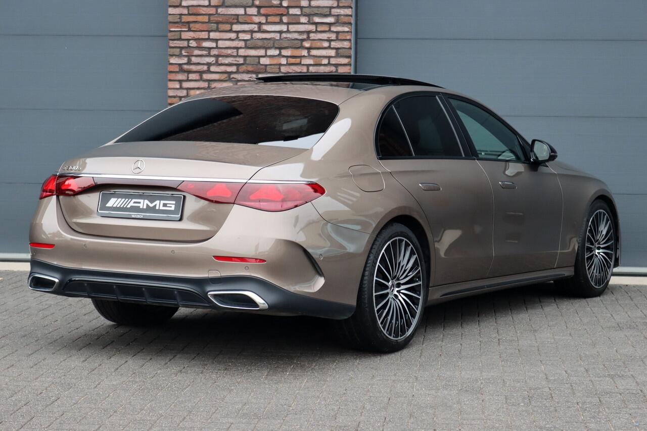 Mercedes-Benz E-KLASSE 300 e AMG Line | Hyperscreen | Airmatic | Achterasbesturing | Distronic+ | Stoelventilatie | Memory | Burmester | HUD | Digital Light | Surround Camera | Verwarmd Stuurwiel |