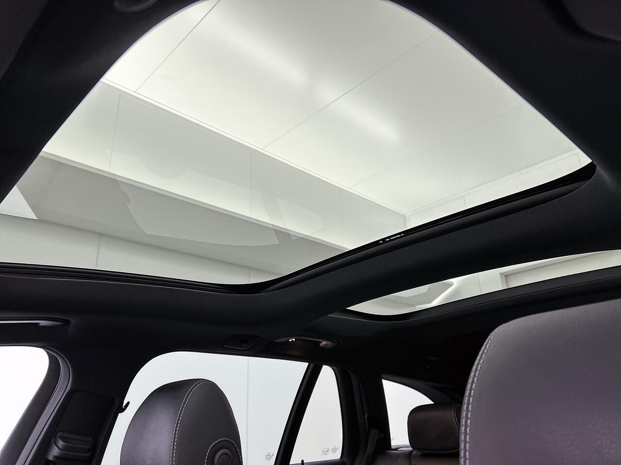 Mercedes-Benz E-estate 300 e Business Solution AMG | Panorama schuif/kanteldak | Trekhaak af fabriek wegklapbaar | Lederen bekleding | Alarm SCM3 | 360gr Camera | Inclusief 24 maanden Mercedes-Benz Certified garantie voor Europa.