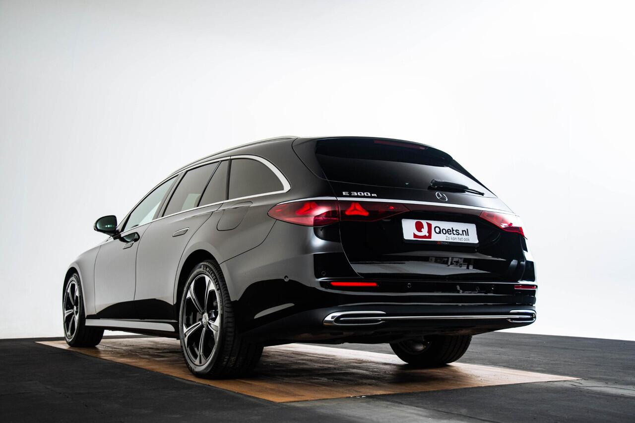 Mercedes-Benz E-estate 300 e Luxury Line Trekhaak - Airmatic - Warmtewerend donkergetint glas - Zwarte hemel - Sierelementen in openporig bruin esdoorn